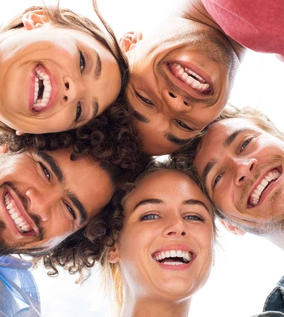 Smiling person showcasing white teeth after laser whitening treatment Coventry
